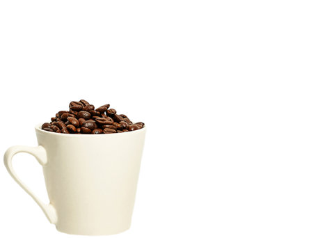coffee beans in a coffee mug. roasted arabica coffee beans. copy spaceの写真素材