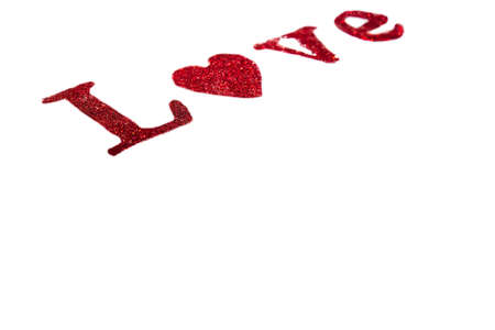 The word love in red letters on a white background. Happy Valentine's Day, Mother's Day, March 8, World Women's Day holiday card concept. flat lay.の写真素材
