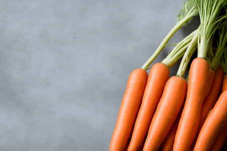 bunch of fresh carrots, healthy natural vegetable, green produceの写真素材