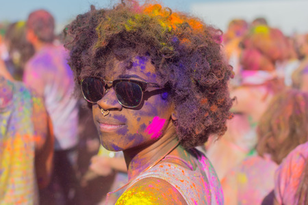 Norwalk, California, USA - March 7, 2015: Unknown women with painted face during the Holi Festival of Colors.のeditorial素材