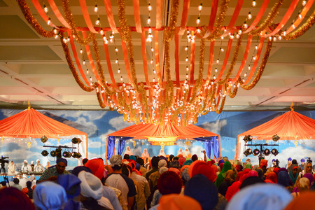 Los Angeles, CA, USA - April 5, 2015: Devotee Sikhs recite prayers at the Anniversary of Baisakhi celebration.のeditorial素材