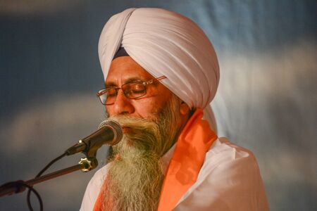 Los Angeles, CA, USA - April 5, 2015:Devotee Sikh with white turban at the Anniversary of Baisakhi celebration.のeditorial素材