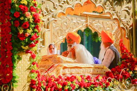 Los Angeles, CA, USA - April 5, 2015: Devotee Sikhs recite prayers at the Anniversary of Baisakhi celebration.のeditorial素材