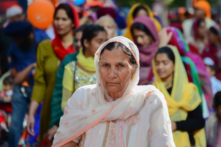 Los Angeles, CA, USA - April 5, 2015: Devotee Sikhs woman marching at the Anniversary of Baisakhi celebration.のeditorial素材