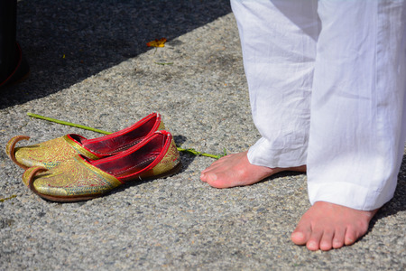 Los Angeles CA USA  April 5 2015: Devotee Sikh praying without shoes at the Anniversary of Baisakhi celebration.のeditorial素材