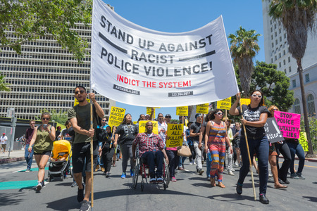 Los Angeles CA USA  May 02 2015: Group with banners and posters during march against the death of Freddie Gray a man of Baltimore who was seriously injured in police custody.のeditorial素材