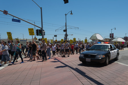 Los Angeles CA USA  May 02 2015: Police watching Protestants during march against the death of Freddie Gray a man of Baltimore who was seriously injured in police custody.のeditorial素材