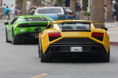 Woodland Hills, CA, USA - July 5, 2015: Lamborghini Huracan and Lamborghini Gallardo car on display at the Supercar Sunday car event.のeditorial素材