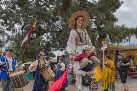 Irwindale, CA - USA - May 07, 2016: People in medieval costumes playing and singing during The 54th Annual Renaissance Pleasure Faire.のeditorial素材
