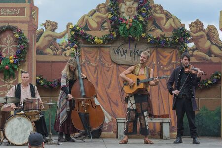 Irwindale, CA - USA - May 07, 2016: Band participants with medieval costume during The 54th Annual Renaissance Pleasure Faire.のeditorial素材