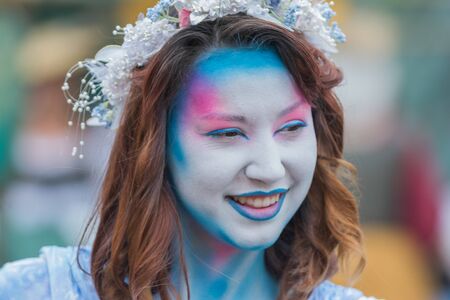 Irwindale, CA - USA - May 07, 2016: Young woman with painted face during The 54th Annual Renaissance Pleasure Faire.のeditorial素材