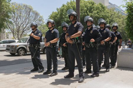 Los Angeles, USA - July 12, 2016 - Officers during march on City Hall following ruling on LAPD fatal...