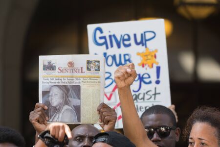 Los Angeles, USA - July 12, 2016 -  Black lives matter protestors during march on City Hall following ruling on LAPD fatal shooting of African American female Redel Jonesのeditorial素材