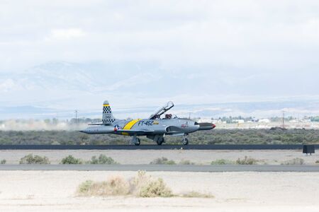 Lancaster, USA - March 25, 2017: Greg Wired Colyer is taxiing an a Lockheed T-33 Shooting Star  during Los Angeles County Air Show at the William J Fox Airfield.のeditorial素材