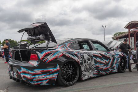 Costa Mesa,USA - April 20, 2019: American muscle car Dodge Charger exhibited at Torqued tour...