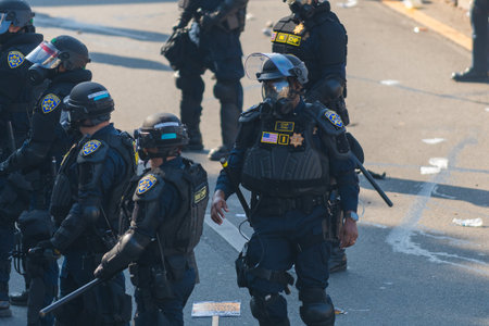 Los Angeles, USA â June 8, 2025: Los Angeles police officers in formation on Freeway 101 during a downtown demonstration against expanded ICE operations and in support of immigrant rightsの写真素材