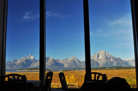 View from restaurant window of snow-capped mountains.の写真素材