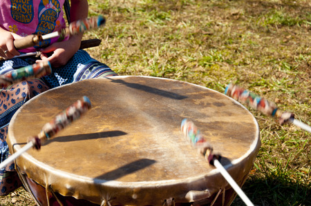 Indian drums being played by a young child.の写真素材