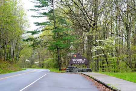 Foothills Parkway sign and road in spring season.の写真素材