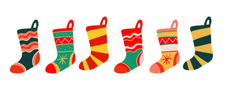 Christmas stockings red green colors. Hanging holiday decorations for gifts.のイラスト素材