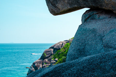 Tropical islands of ocean blue sea water and white sand beach at Similan Islands with famous Sail Rock, Phang Nga Thailand nature landscape. High quality photoの写真素材