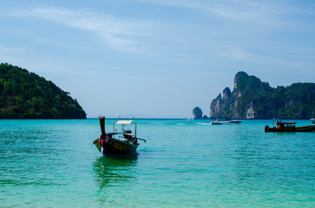Views of the Islands of Thailand and turquoise water, rocks, yachts or boats.の写真素材