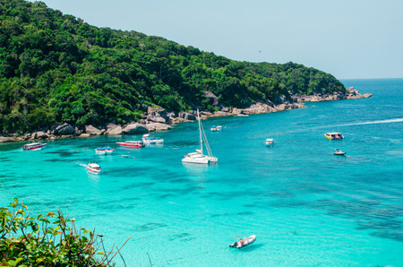 Tropical islands of ocean blue sea water and white sand beach at Similan Islands with famous Sail...