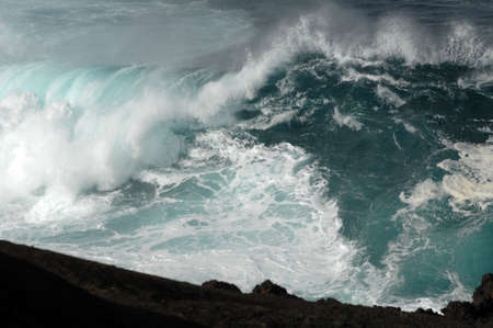 breaking waveの写真素材