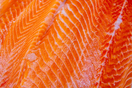 slice of fresh salmon on ice.
