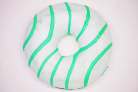 bright green donut top view. White backgroundの写真素材