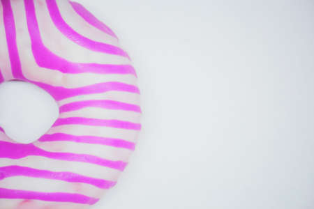 purple donut top view. White background copy spaceの写真素材