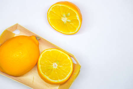 lemons in a box top view. White background. copy space
