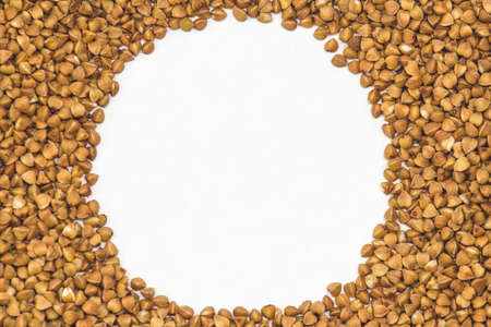 Buckwheat seeds closeup isolated on white background copy spaceの写真素材