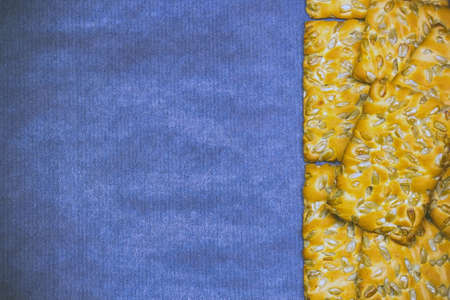 rectangular cookies on a dark blue background copy space