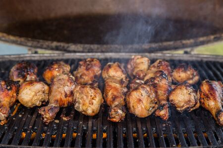Chicken drumsticks grillingの写真素材