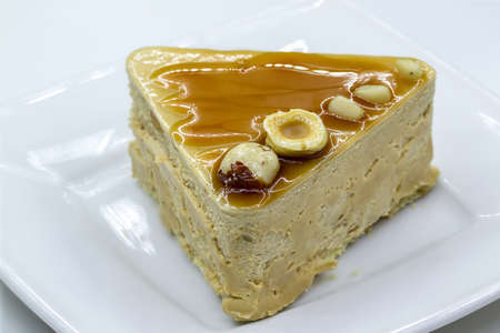 gentle yoghurt cake with hazelnut on a plateの写真素材