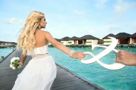 Bride on Maldives with an ampersand. の写真素材