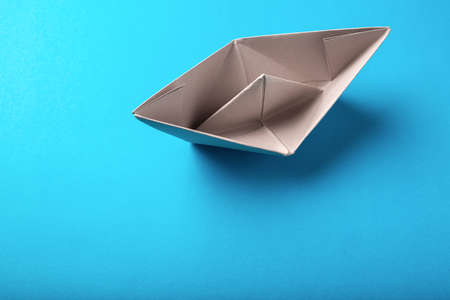 boat paper origami on the blue blackgroundの写真素材