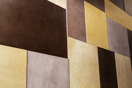 Decorative wood tile plywood in different colors. Decorating the walls.の写真素材
