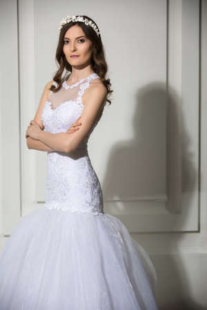 Portrait of elegant bride in a beautiful white dressの写真素材