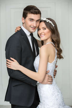 Beautiful fashion wedding couple in the studio.の写真素材