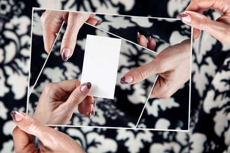 multitude hands of women hold empty white card.の写真素材