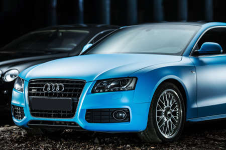 Kiev, Ukraine - 14 May 2014: Audi S5 Coupe tuning sport-car. It colored in blue color. Editorial photo. Closeup.のeditorial素材