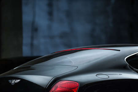 Kiev, Ukraine - 14 May 2014: Bentley Continental GT Coupe tuning sport-car. It colored in black...
