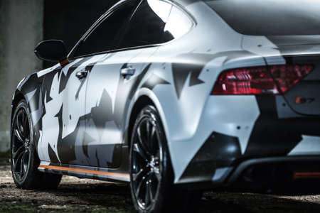 Kiev, Ukraine - 14 May 2014: Audi S7 tuning sport-car. It colored in white, black, gray colors with...