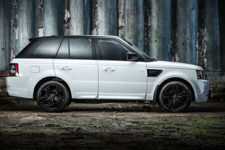 Kiev, Ukraine - 14 May 2014: Range Rover Sport tuning sport-car. It colored in white color. Editorial photo. Shoot from the side.のeditorial素材