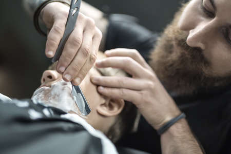 Funny shaving of little boyの写真素材