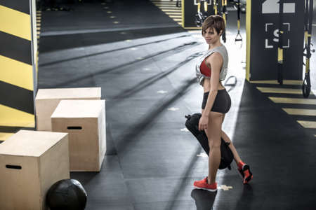 Sportive girl in gymの写真素材