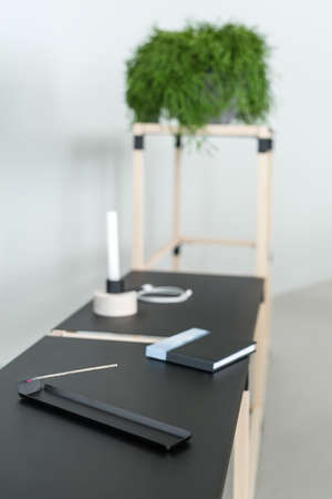 Wooden construct with black tabletopsの写真素材