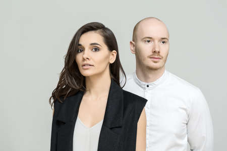 Bearded man with woman in studioの写真素材